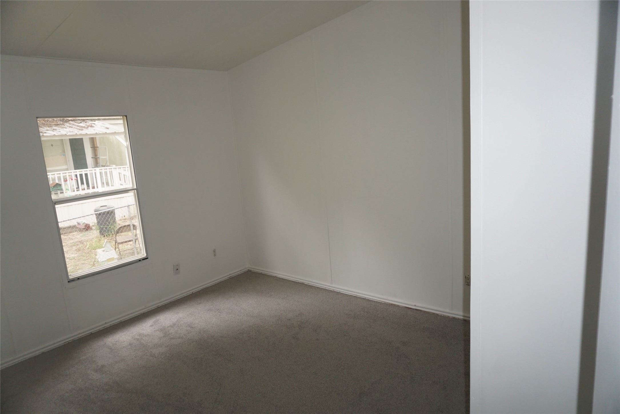 9603 Cedar Ridge Court Willis, TX 77318 - Photo 15 of 25 a view of an empty room with a window