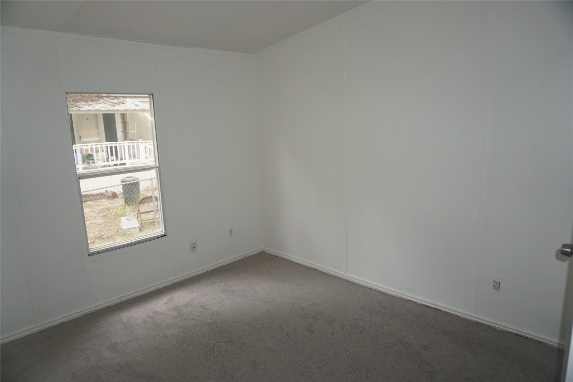 9603 Cedar Ridge Court Willis, TX 77318 - Photo 16 of 25 an empty room with windows