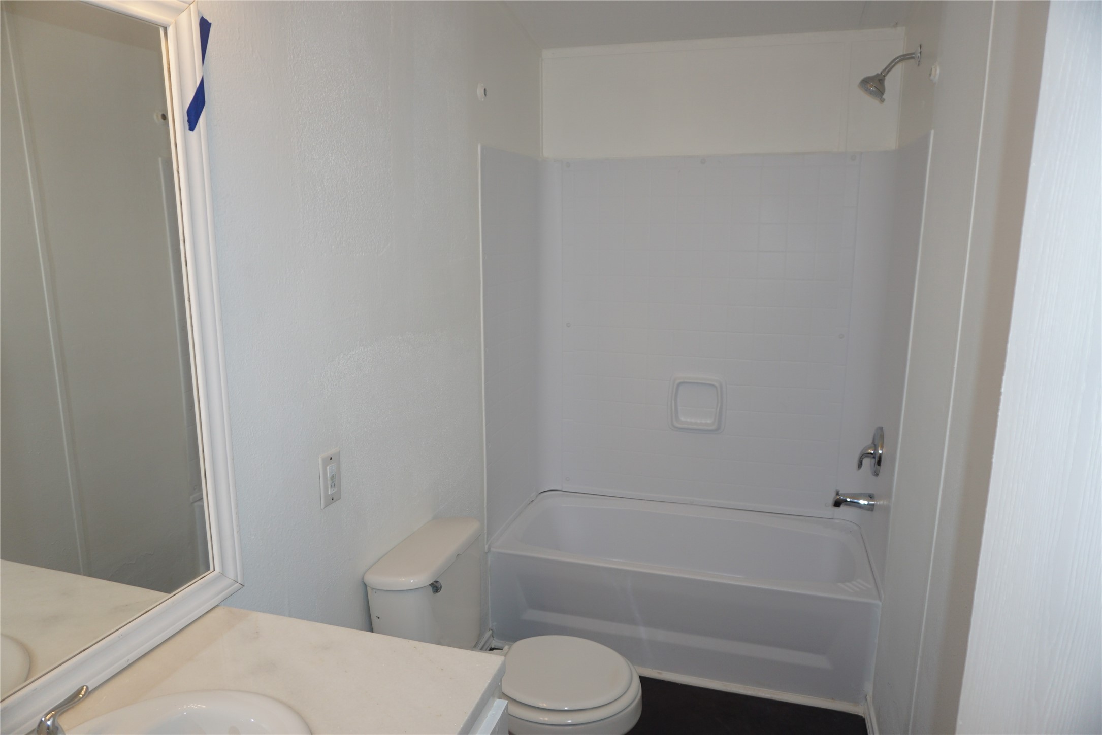 9603 Cedar Ridge Court Willis, TX 77318 - Photo 18 of 25 a bathroom with a toilet and a tub
