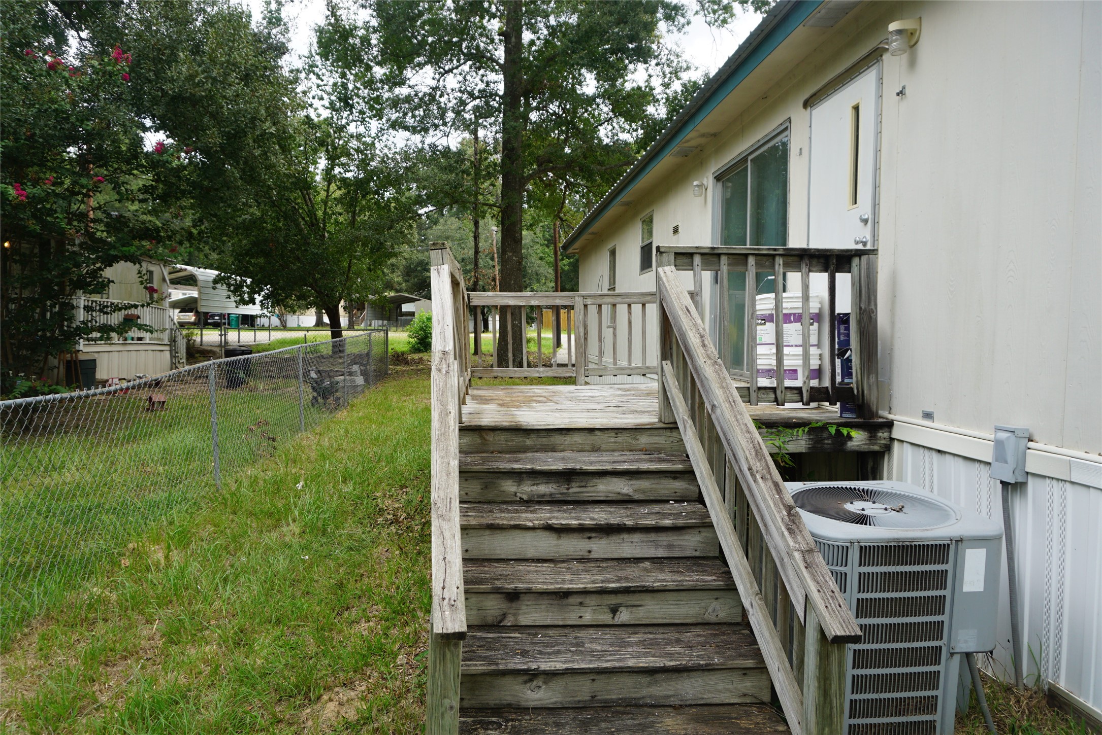 9603 Cedar Ridge Court Willis, TX 77318 - Photo 25 of 25 a view of deck with patio and yard