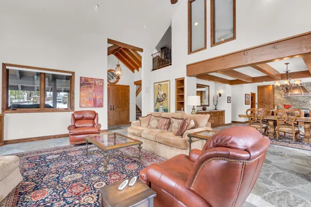 a kitchen with stainless steel appliances granite countertop a sink and a stove