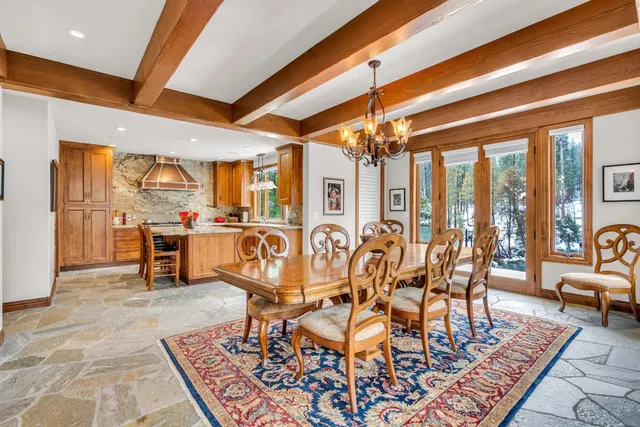 a kitchen with stainless steel appliances granite countertop a stove and a refrigerator