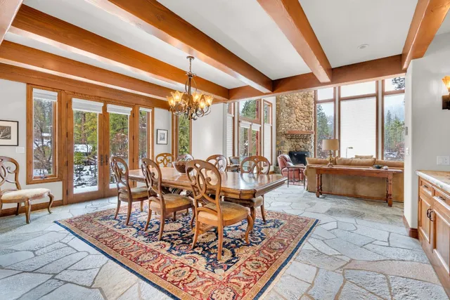 a kitchen with stainless steel appliances granite countertop a refrigerator sink and cabinets