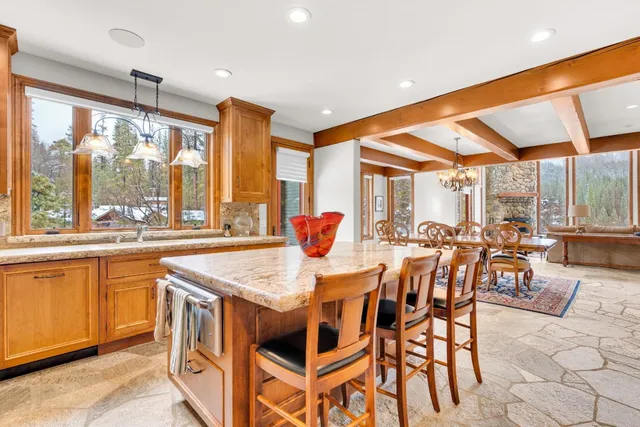 a view of a hallway with paintings on the wall