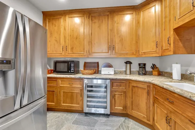 a bathroom with a sink double vanity and a mirror