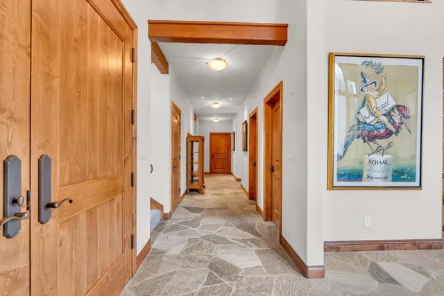 a bathroom with a toilet and shower