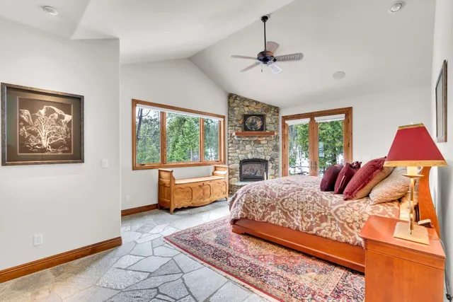 a view of a hallway with paintings on the wall