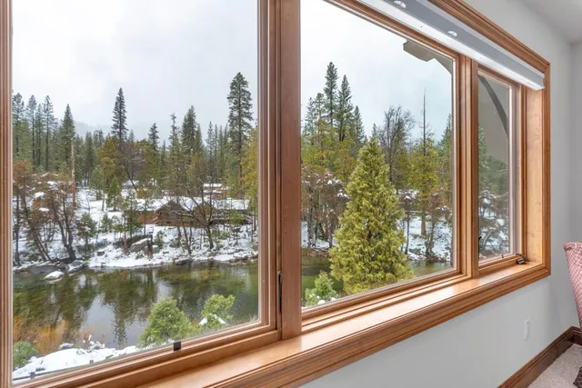 a bathroom with a toilet sink and a window