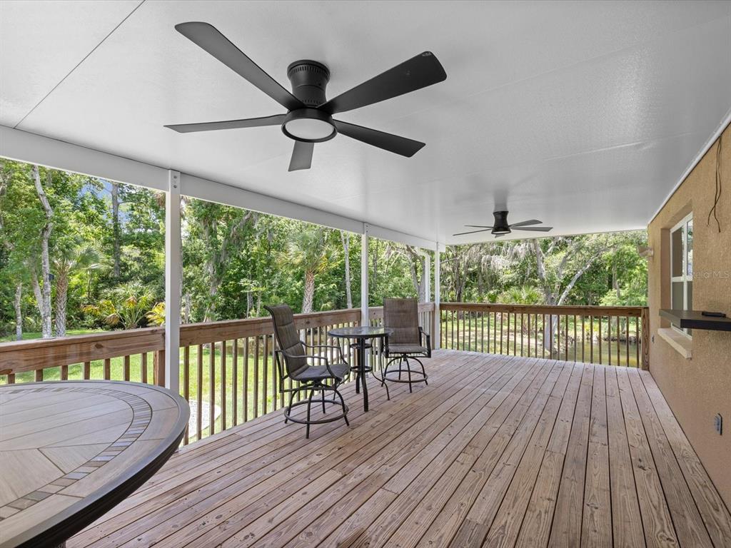 5904 Springrun Court Holiday, FL 34690 - Photo 29 of 53 a view of a balcony with furniture
