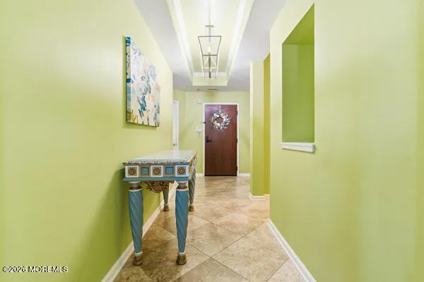 a view of a garden and front view of a building