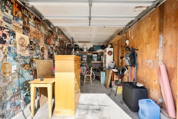 a view of a storage & utility room with a washer and dryer