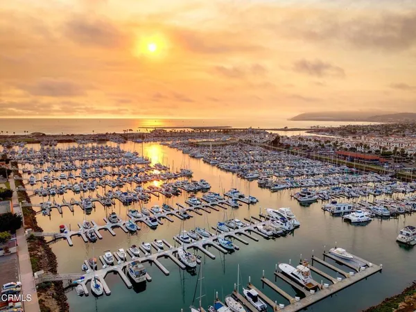 a view of an ocean and a mountain