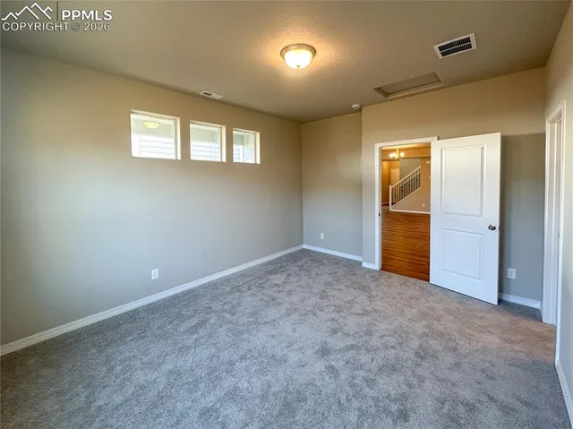 a bathroom with a sink double vanity granite and a mirror