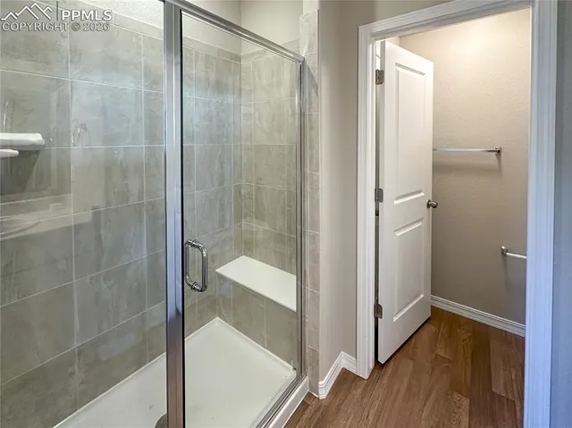 a view of a room with racks on the wall