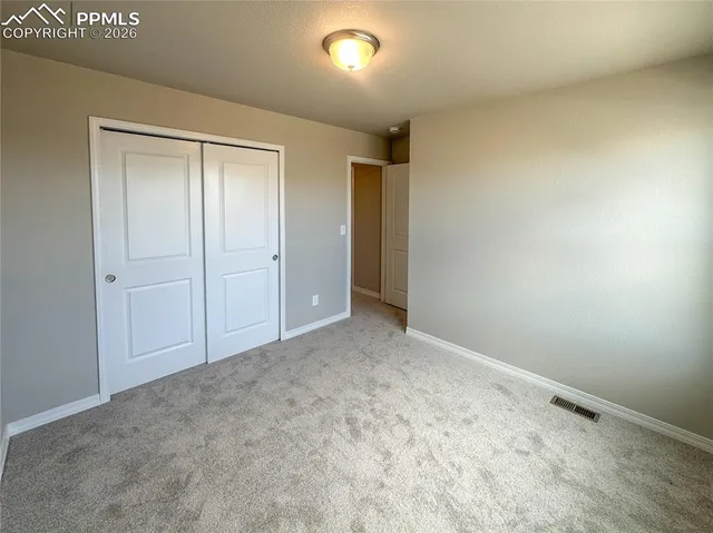 an empty room with an entryway