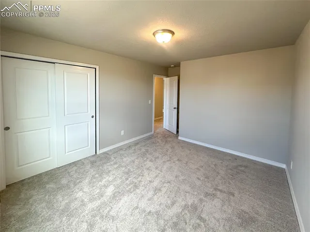 a bathroom with a tub a sink and a shower