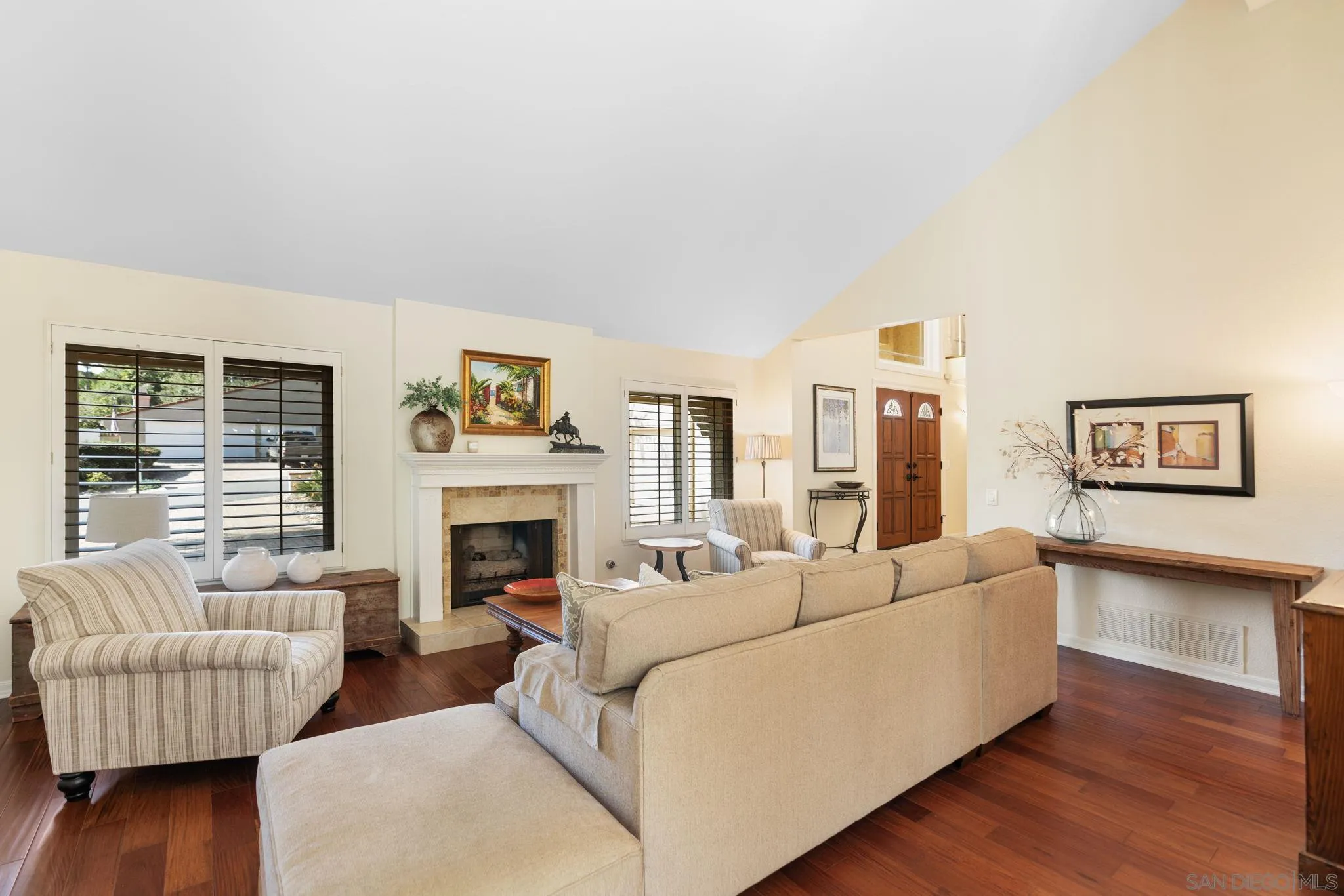 452 Avenida Adobe Escondido, CA 92029 - Photo 3 of 11 a living room with furniture and a fireplace