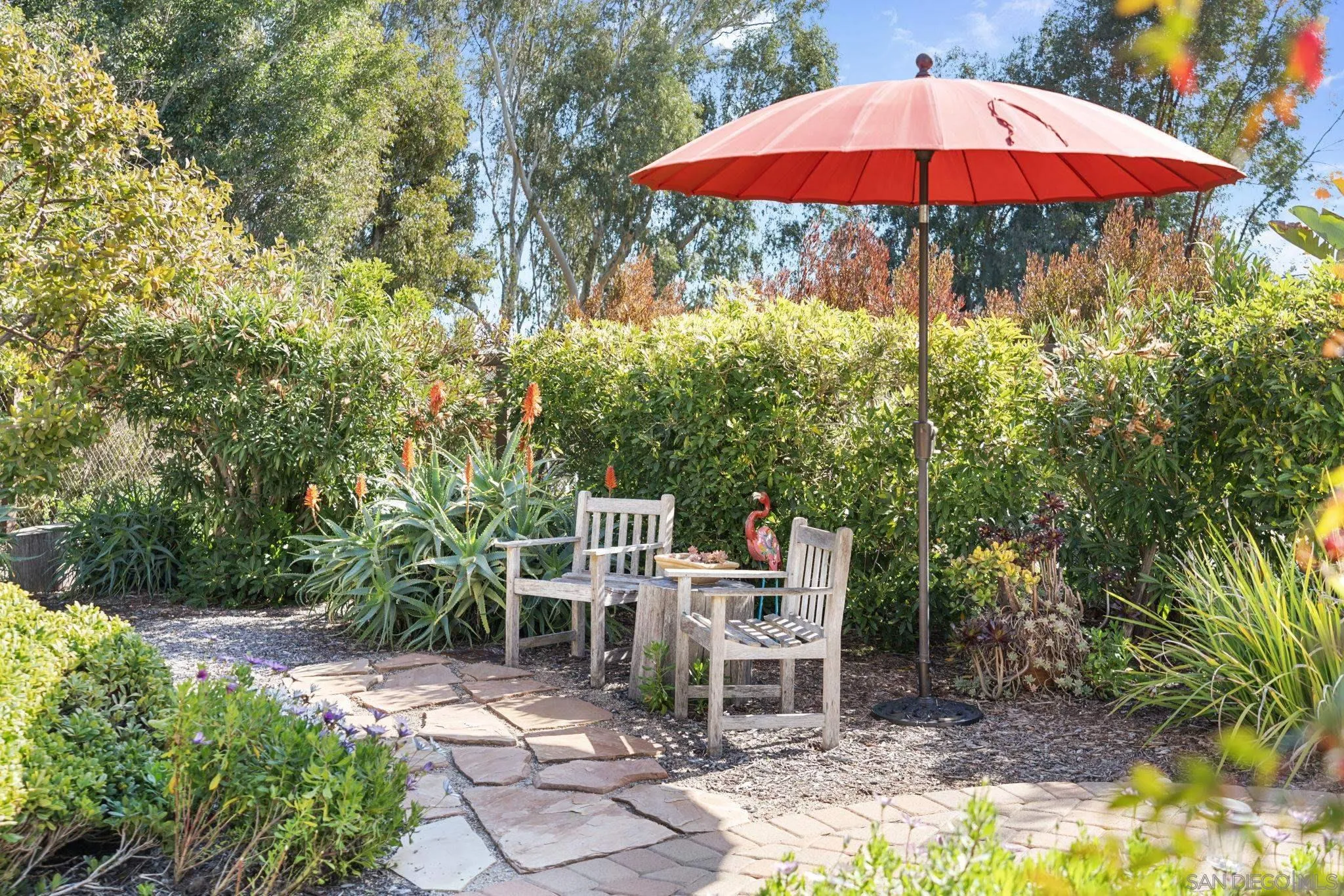 452 Avenida Adobe Escondido, CA 92029 - Photo 9 of 11 a view of a backyard with furniture and a garden