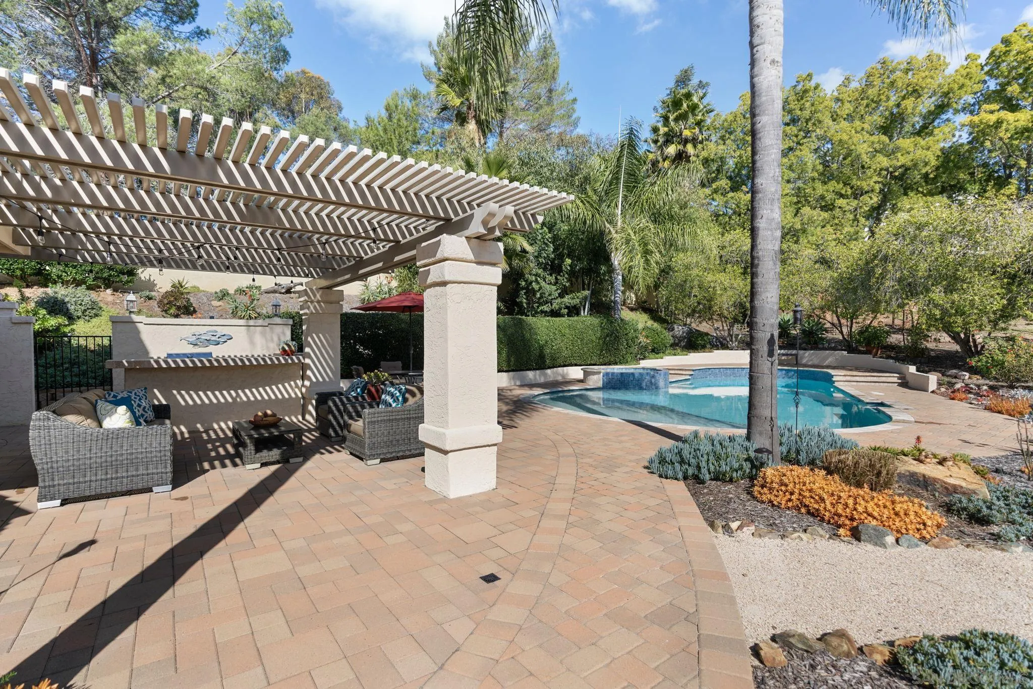 452 Avenida Adobe Escondido, CA 92029 - Photo 10 of 11 a view of a patio with table and chairs potted plants