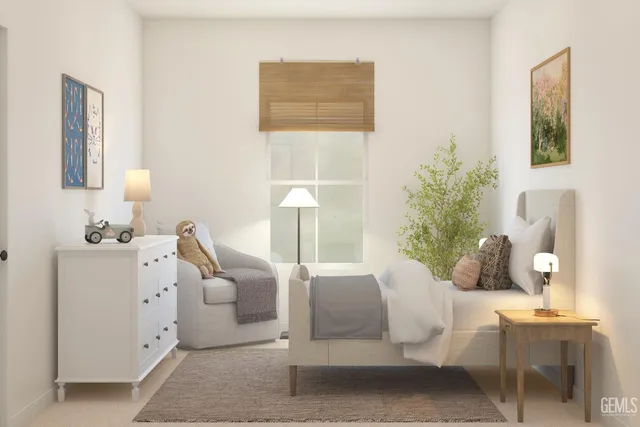 a bedroom with furniture and a window