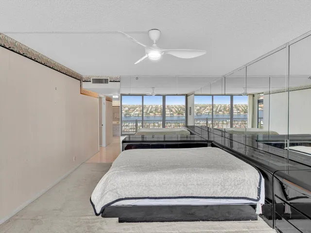 a view of a hallway with white walls