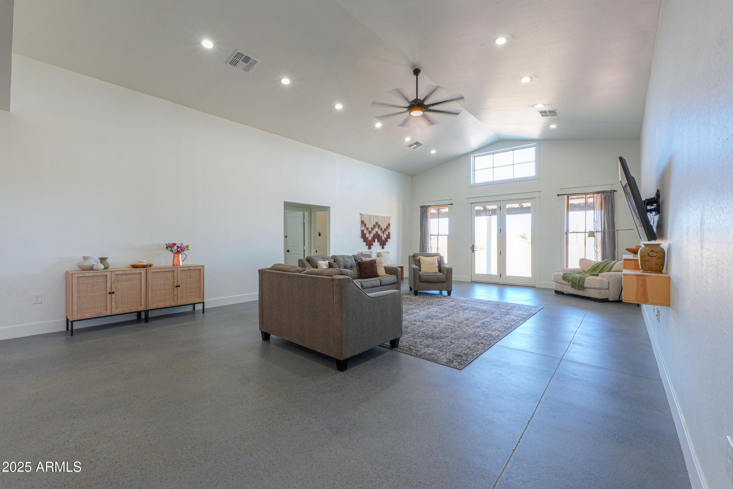 55091 West Pima Road Maricopa, AZ 85139 - Photo 11 of 43 Space for a pool table!