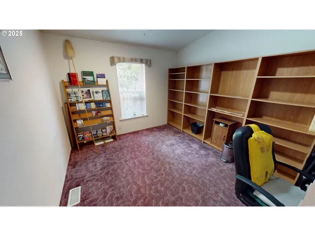 a room with furniture and a window