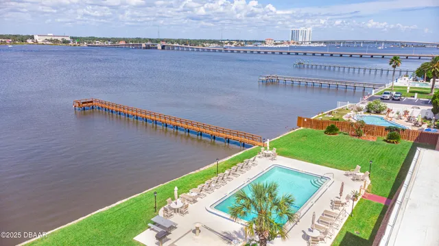 a view of a back yard with an outdoor space