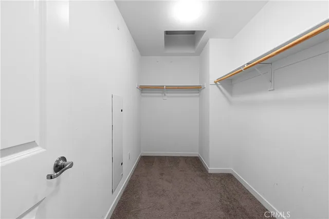 a spacious bathroom with a double vanity sink double and mirror