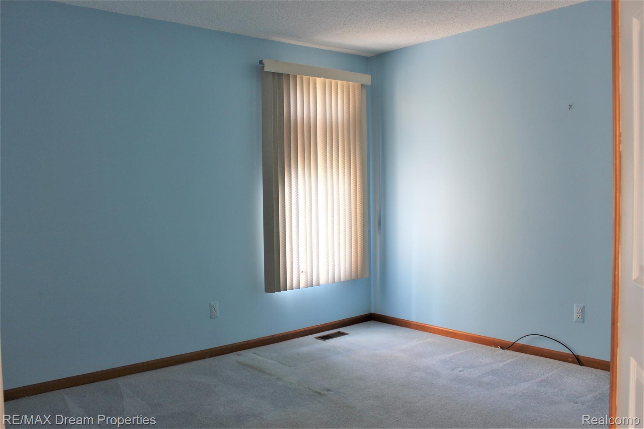 21975 River Ridge Trail Farmington, MI 48335 - Photo 15 of 22 second bedroom.JPG