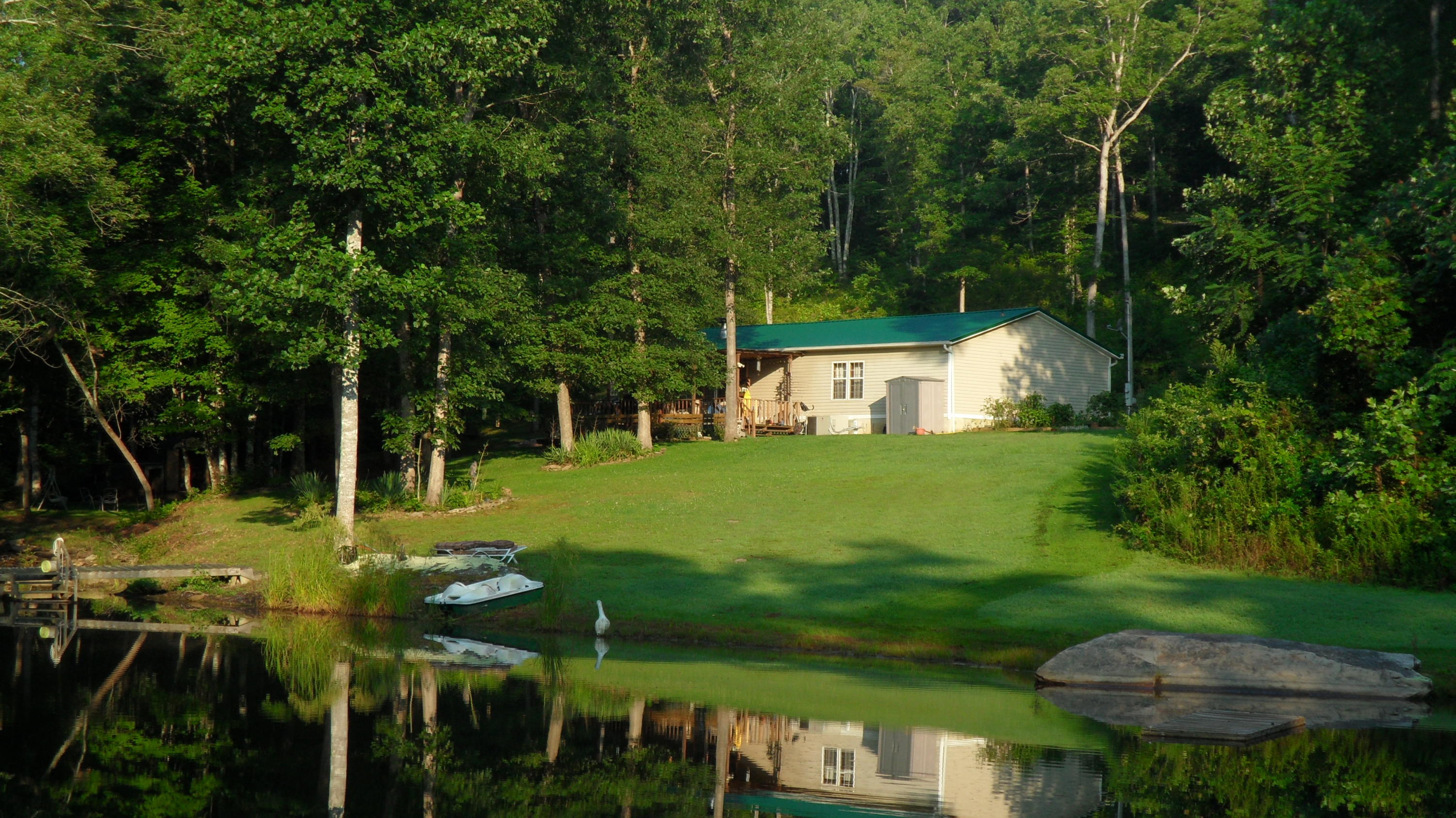 798 Maple Branch Road Sparta, TN 38583 - Photo 3 of 23 Back o f Home & Stocked Pond