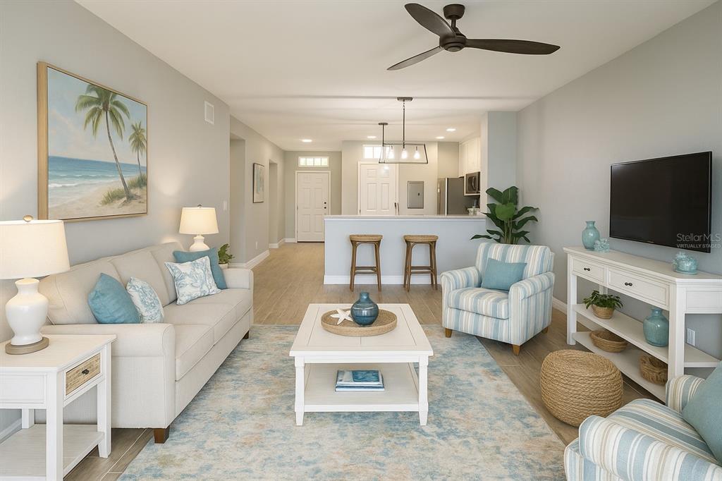 2000 Bal Harbor Boulevard, Unit 1012 Punta Gorda, FL 33950 - Photo 18 of 61 a living room with furniture and a flat screen tv