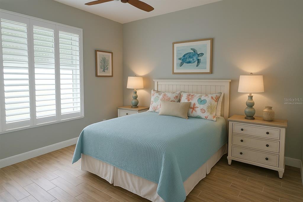 2000 Bal Harbor Boulevard, Unit 1012 Punta Gorda, FL 33950 - Photo 20 of 61 a bedroom with a bed and a night stand