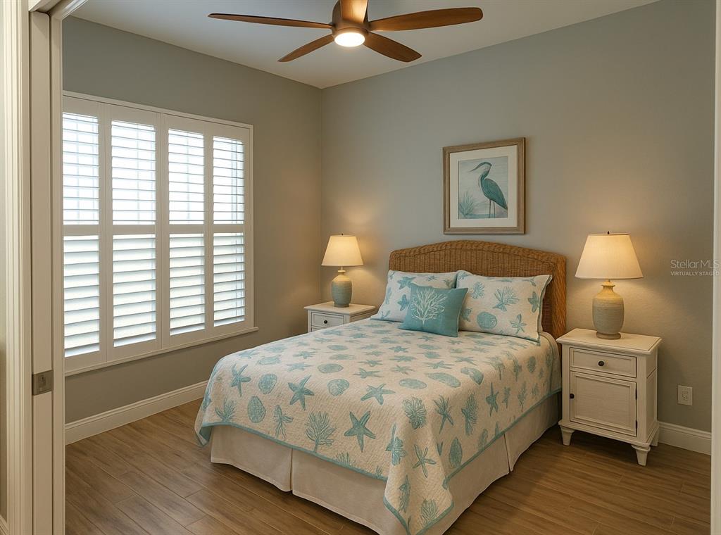 2000 Bal Harbor Boulevard, Unit 1012 Punta Gorda, FL 33950 - Photo 28 of 61 a bedroom with a bed and a night stand