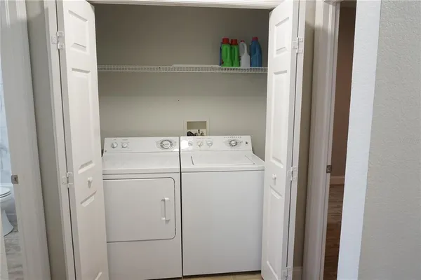 a view of a room with racks on the wall