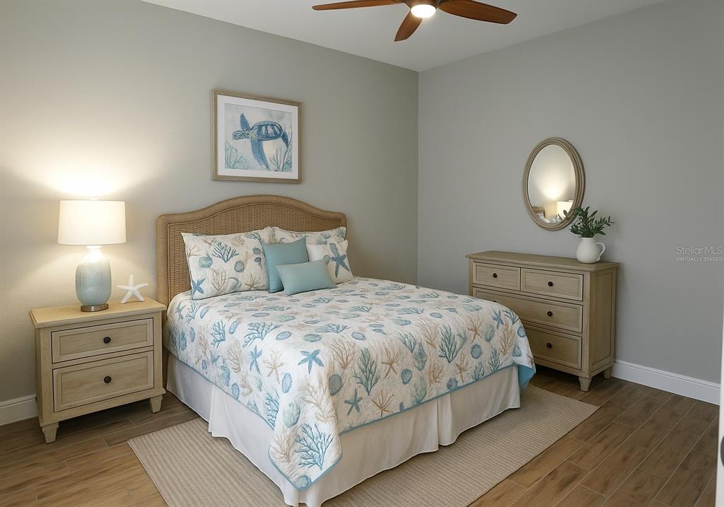 2000 Bal Harbor Boulevard, Unit 1012 Punta Gorda, FL 33950 - Photo 35 of 61 a bedroom with a bed and a lamp