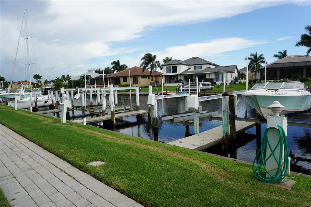 2000 Bal Harbor Boulevard, Unit 1012 Punta Gorda, FL 33950 - Photo 45 of 61 a view of a house with backyard porch and sitting area