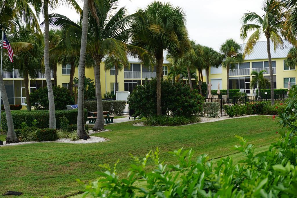 2000 Bal Harbor Boulevard, Unit 1012 Punta Gorda, FL 33950 - Photo 48 of 61 a view of a park with a palm trees