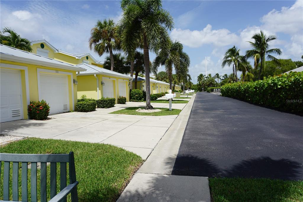 2000 Bal Harbor Boulevard, Unit 1012 Punta Gorda, FL 33950 - Photo 60 of 61 a view of a backyard with a garden and plants
