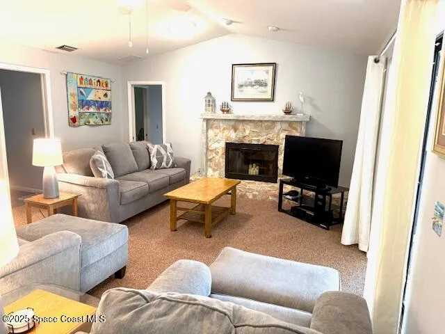 a living room with furniture window and a table