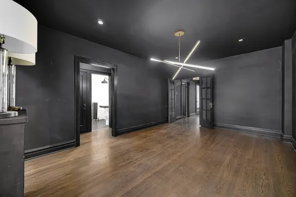 a view of hallway with a large window