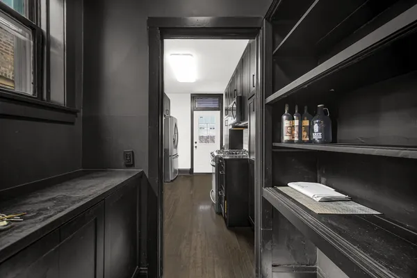 a kitchen with stainless steel appliances granite countertop a stove and a refrigerator