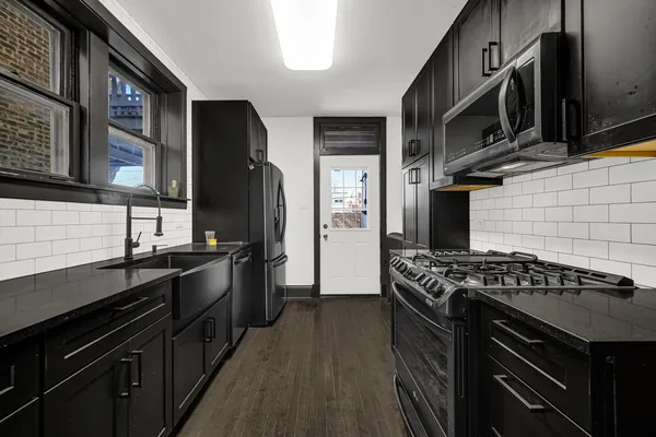 a view of a porch with furniture