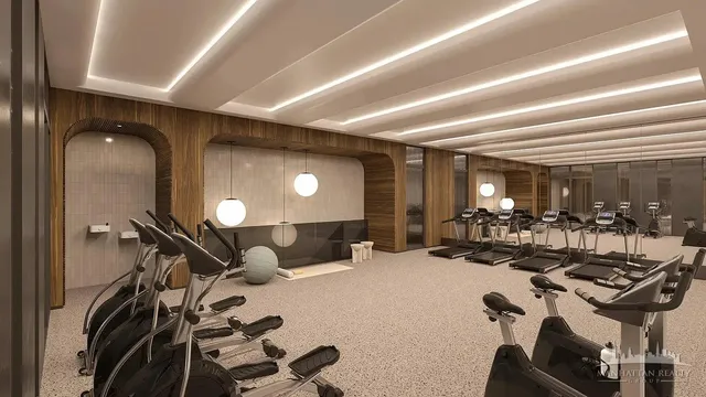 a very nice looking room with a large window and chairs