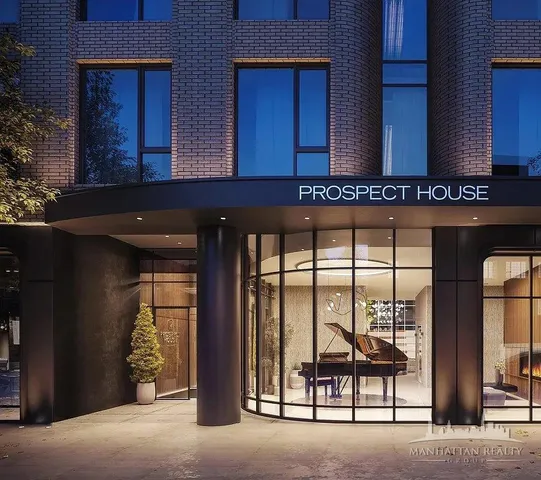 a view of a lobby with furniture and windows