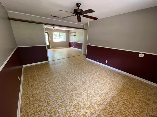 a view of an empty room with window