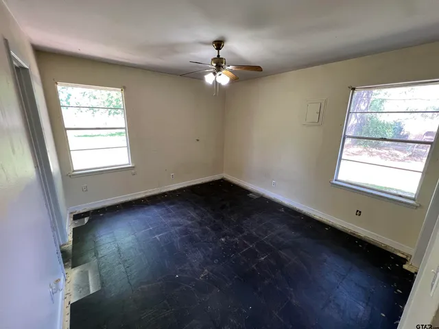 a bathroom with a bath tub and a sink