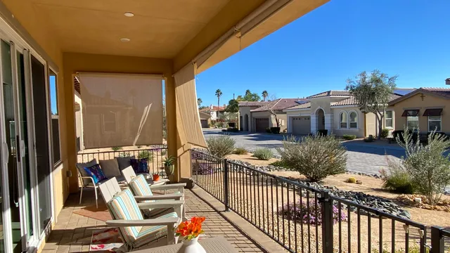 a view of balcony with furniture