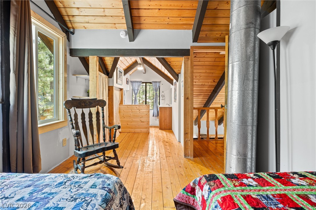 2146 Via Spes Nostra Street Mount Charleston, NV 89124 - Photo 27 of 33 Natural wood floors and exposed beam ceilings create a warm, inviting interior.