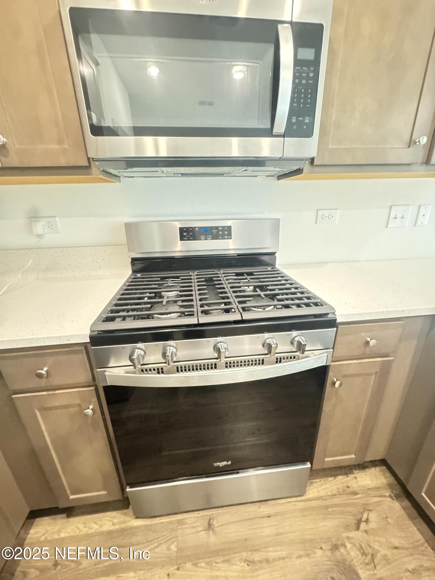 13505 Ute Jacksonville, FL 32218 - Photo 12 of 34 a stove top oven sitting inside of a kitchen